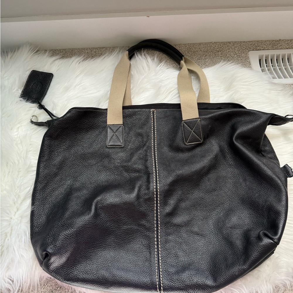 Roots Black Leather Travel Bag with Tan Straps